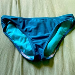 Girls teal Speedo swim bottoms with grips on bottom